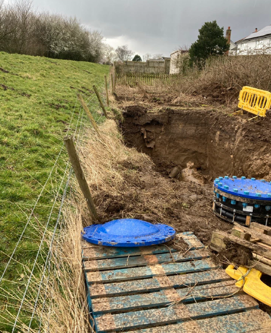 Photo of excavated area adjacent to reservoir bank - supporting image